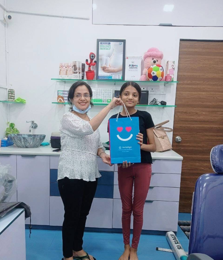 A young patient with a clear-aligner smile bag